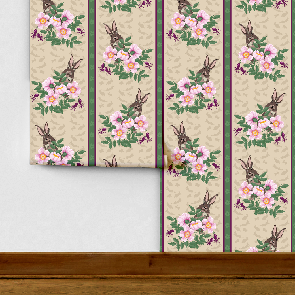 The artwork depicts a stylized brown hare partially concealed behind a cluster of green leaves and pink flowers with yellow centers. The background is dark green with subtle leafy patterns. Two vertical stripes—one dark purple and one green with small floral motifs—run along the left side, contrasting with the otherwise naturalistic elements. The composition balances the lively flora and fauna with a decorative, patterned design.